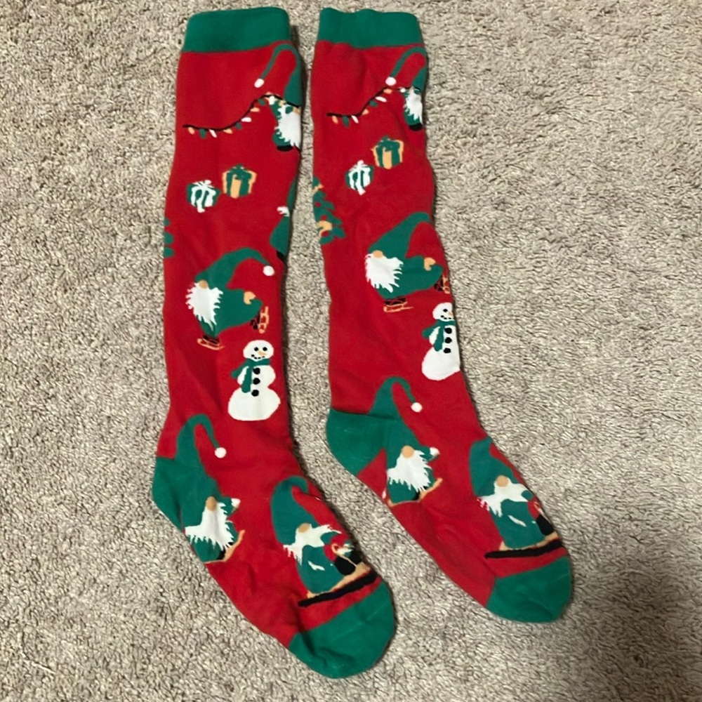 Knee high gnomes enjoying Christmas socks